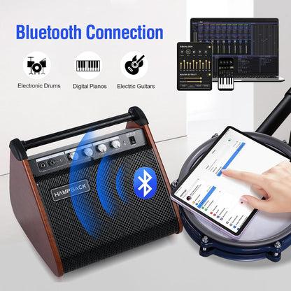 HAMPACK portable Bluetooth speaker with wood-grain sides and a black front grille, shown connected to a tablet on a drum kit with a hand touching the screen. The image includes 'Bluetooth Connection' text, icons for electronic drums, digital pianos, and electric guitars, and a small inset showing a laptop, tablet, and phone with audio software.
